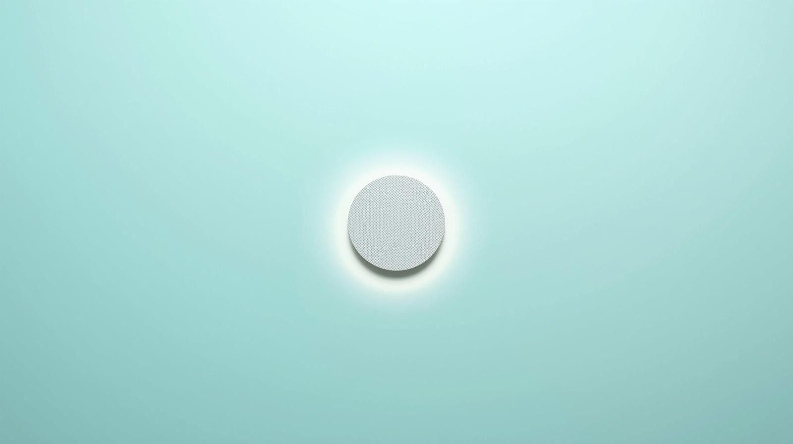 A glowing circle patch on a clean teal background